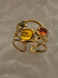 Bague ouverte acier inoxydable dorée géométrique avec pierres multicolores