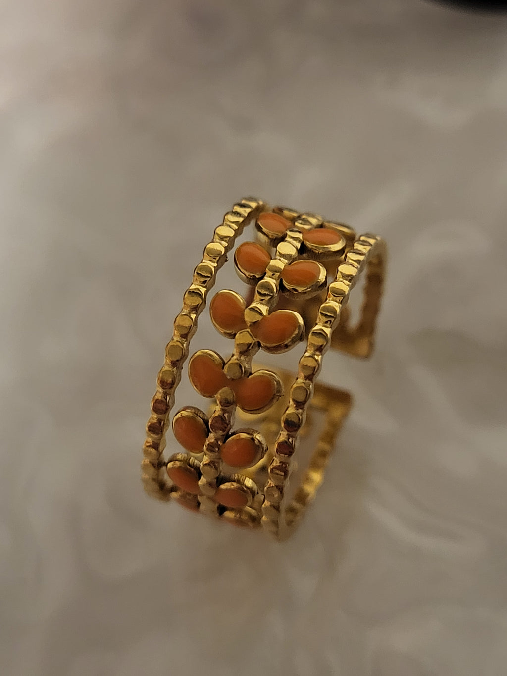 Bague ouverte acier inoxydable feuilles dorées et oranges