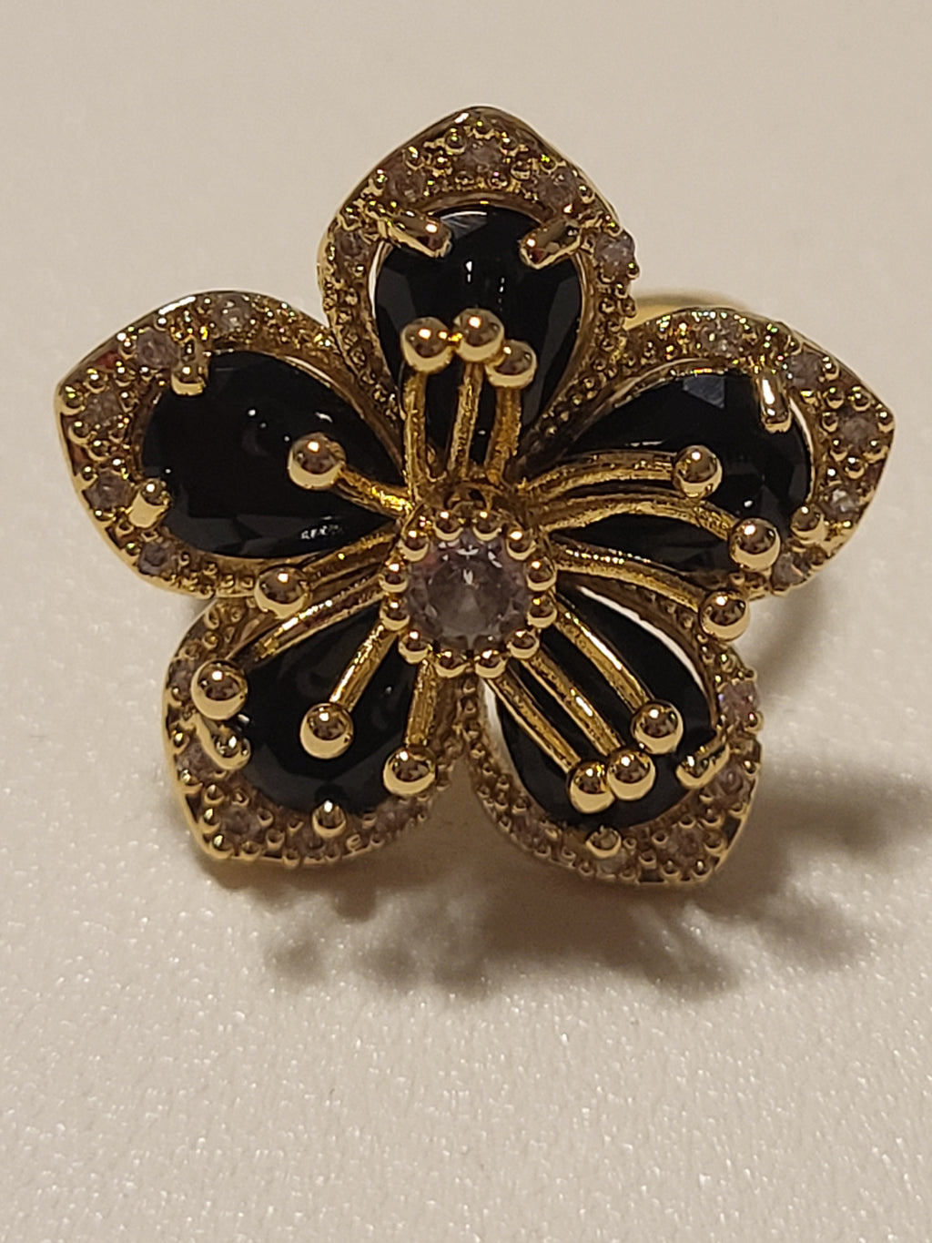 Bague acier inoxydable doré fleur zircon noir