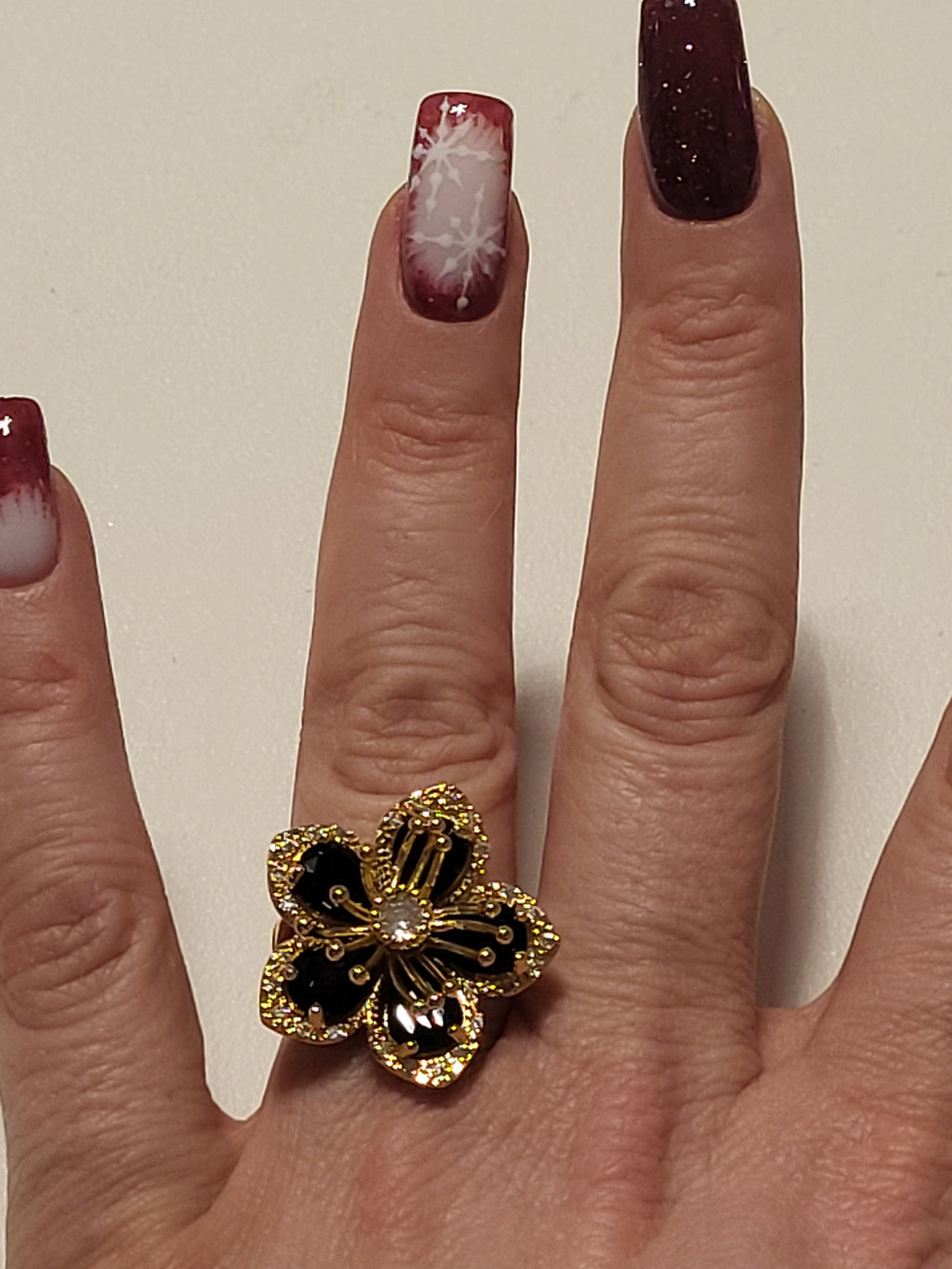 Bague acier inoxydable doré fleur zircon noir