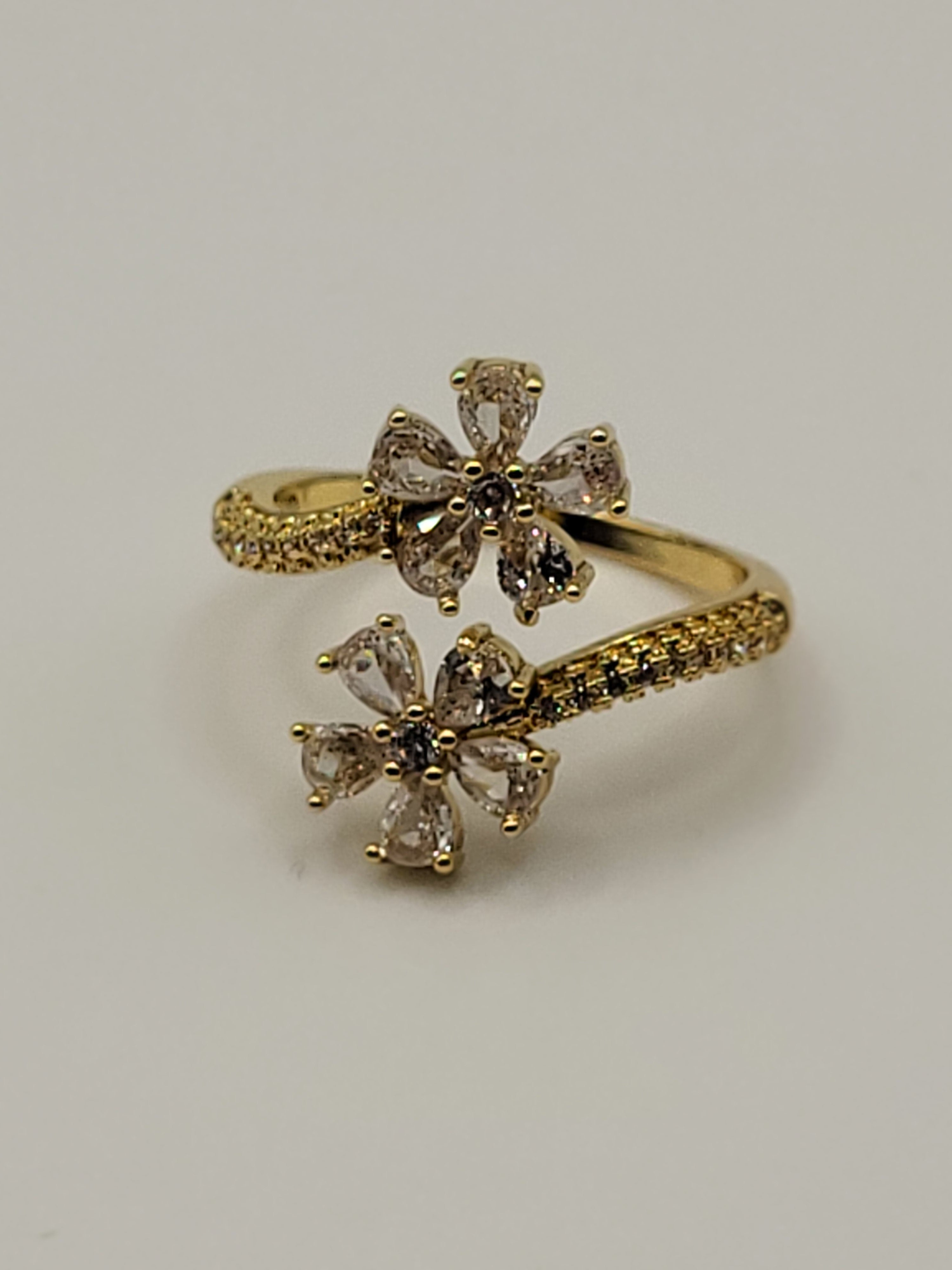 Bague ouverte acier inoxydable doré avec fleurs en zircon blanc
