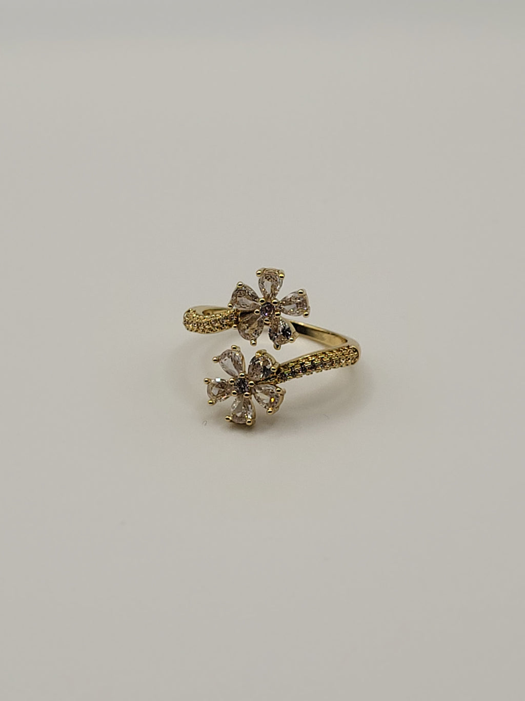 Bague ouverte acier inoxydable doré avec fleurs en zircon blanc