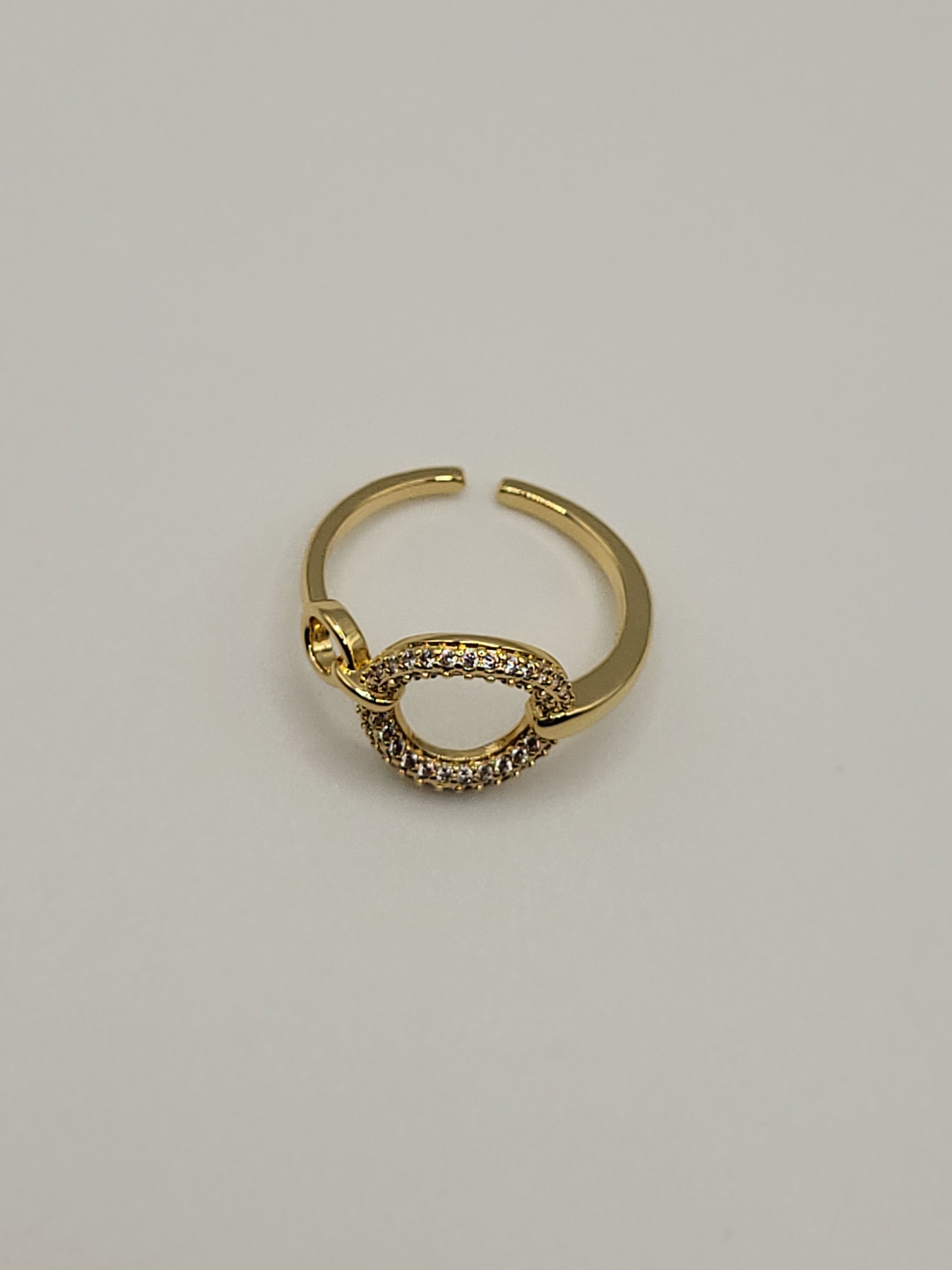 Bague ouverte acier inoxydable et zircon rond dorée