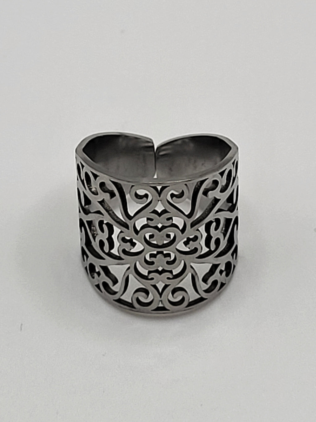 Bague acier inoxydable ajustable motif floral ajouré argenté