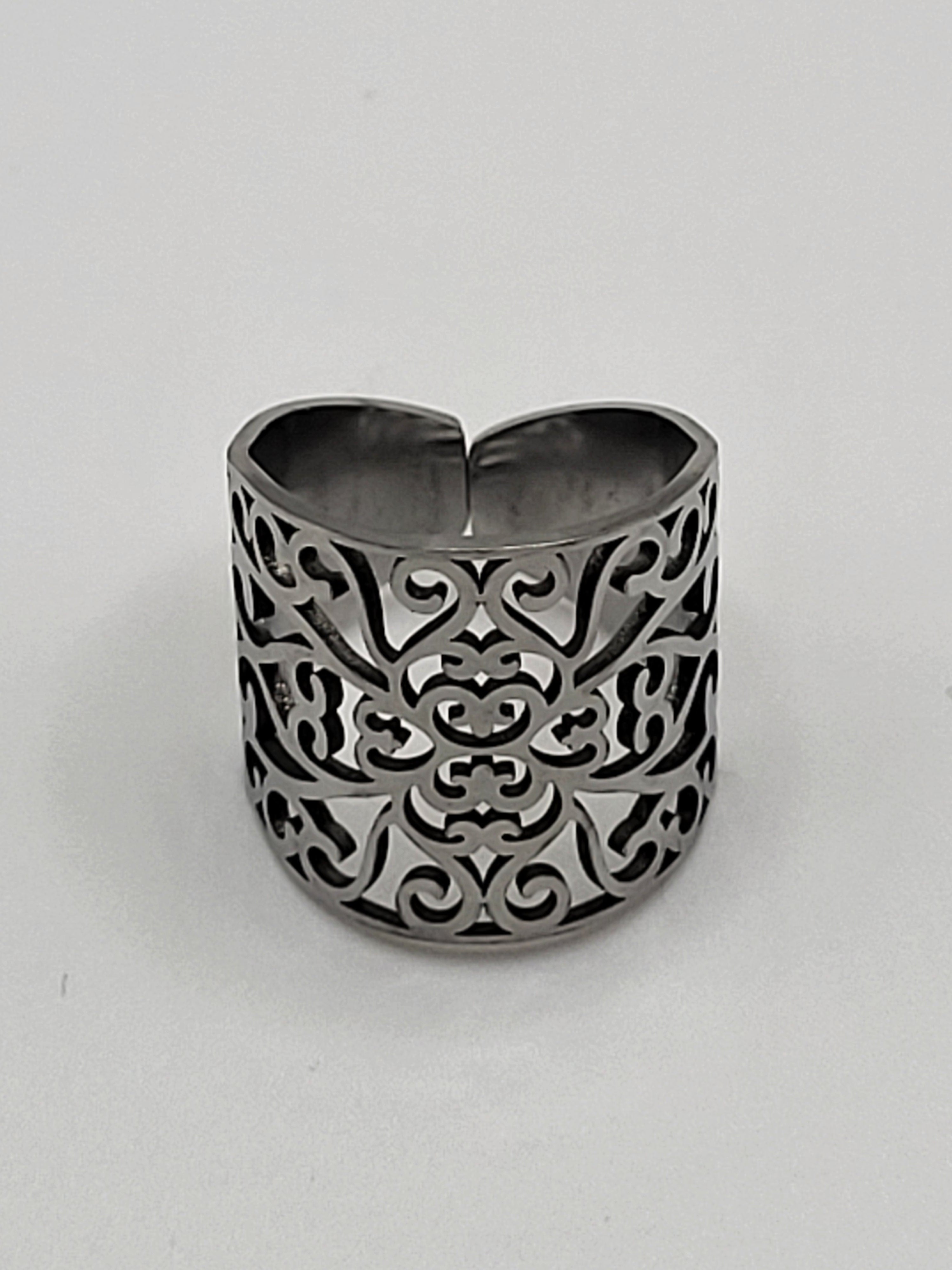 Bague acier inoxydable ajustable motif floral ajouré argenté