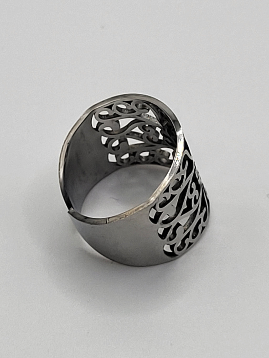 Bague acier inoxydable ajustable motif floral ajouré argenté