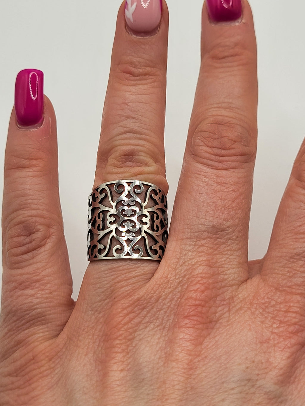 Bague acier inoxydable ajustable motif floral ajouré argenté