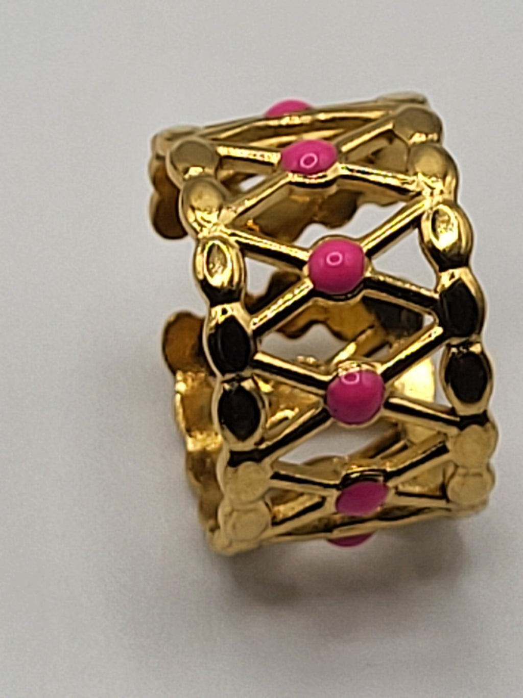 Bague acier inoxydable doré croisillons points roses