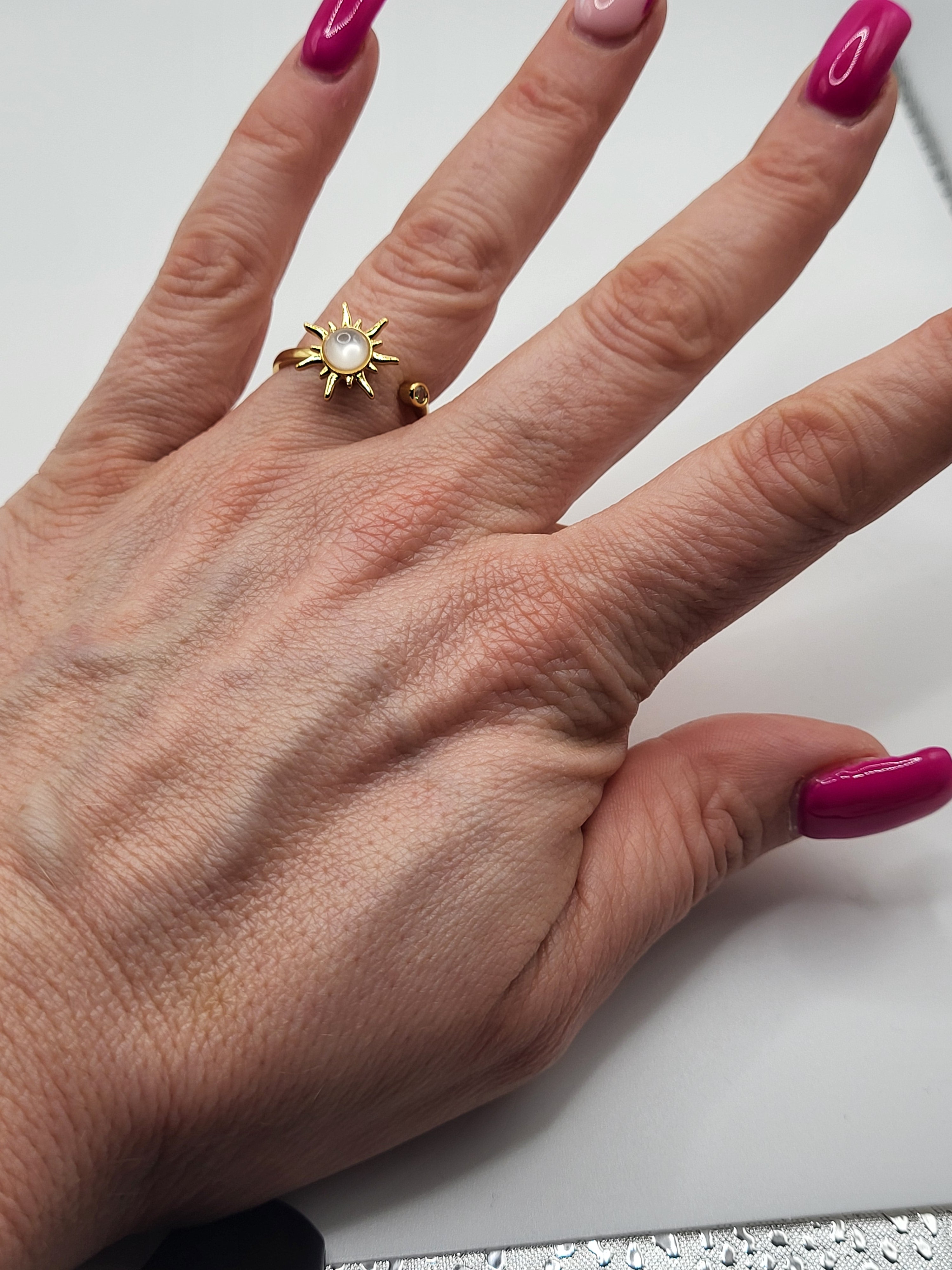 Bague ouverte acier inoxydable doré soleil anti-stress - le soleil tourne