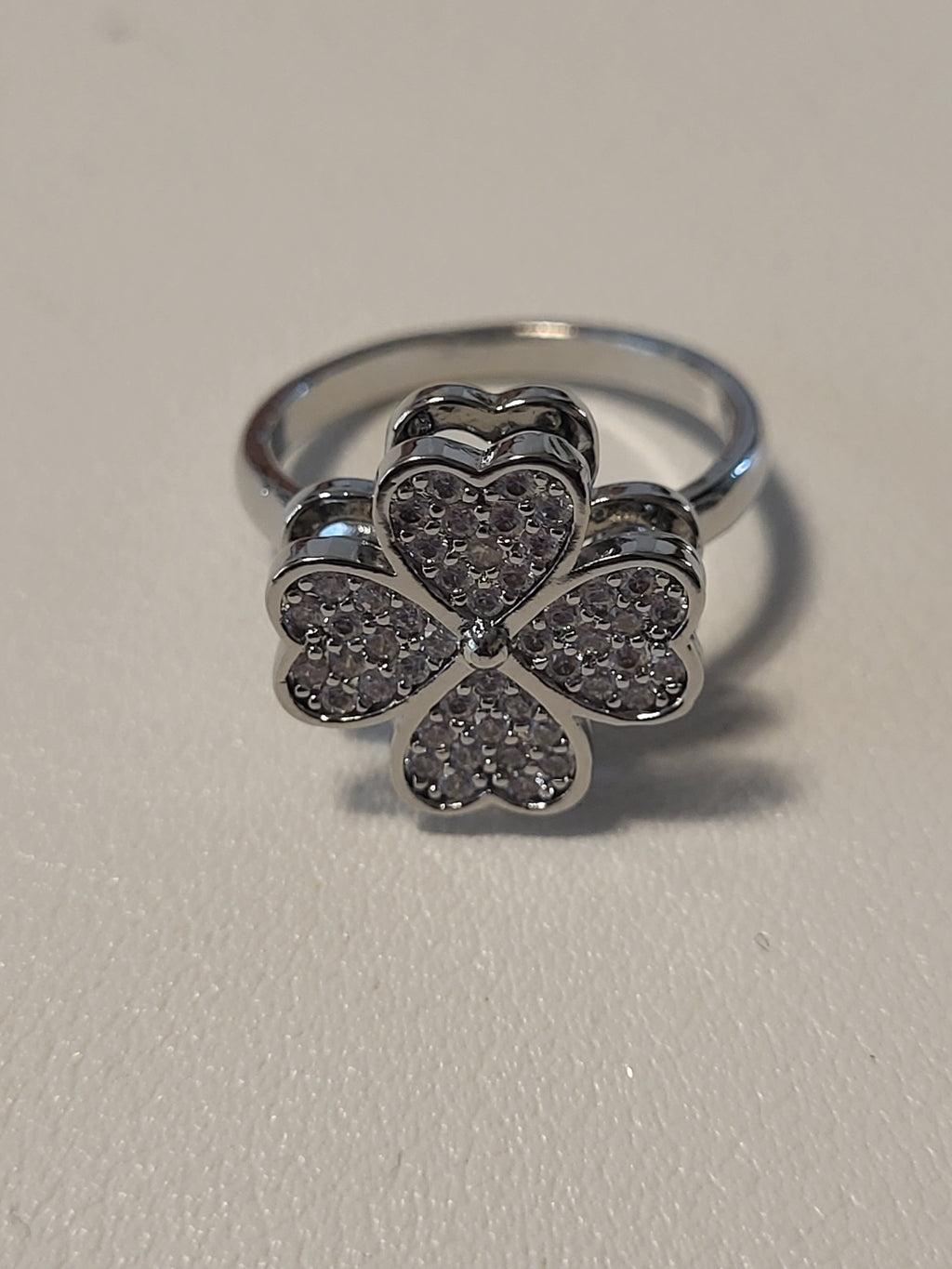 Bague acier inoxydable argentée ouverte fleur zircon anti-stress - la fleur tourne