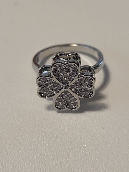 Bague acier inoxydable argentée ouverte fleur zircon anti-stress - la fleur tourne