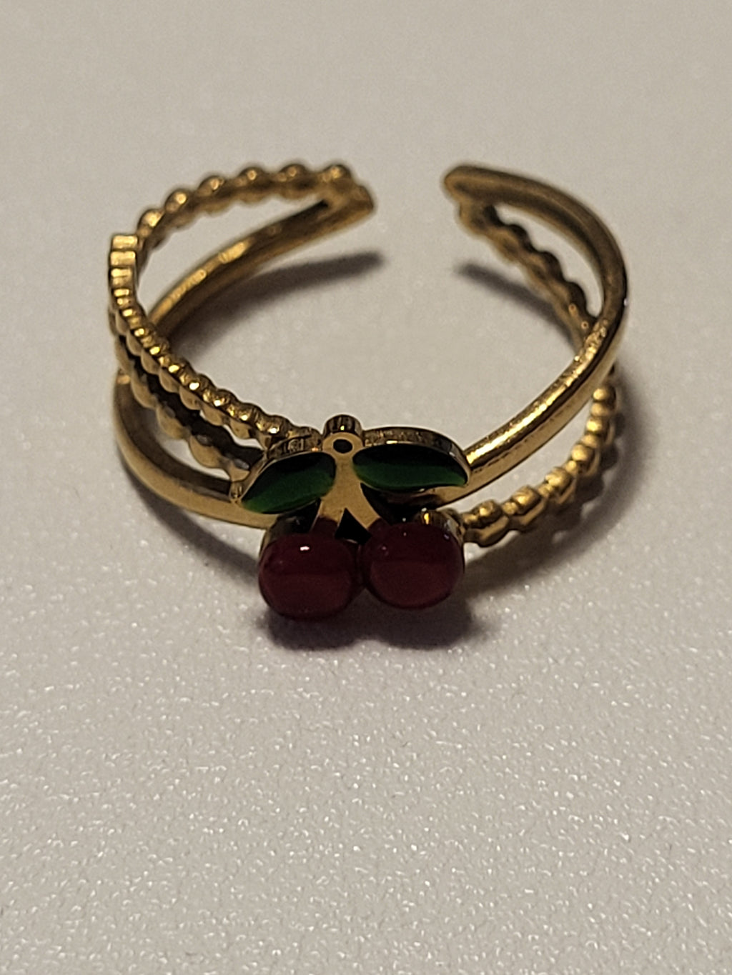 Bague ouverte en forme de cerise dorée acier inoxydable