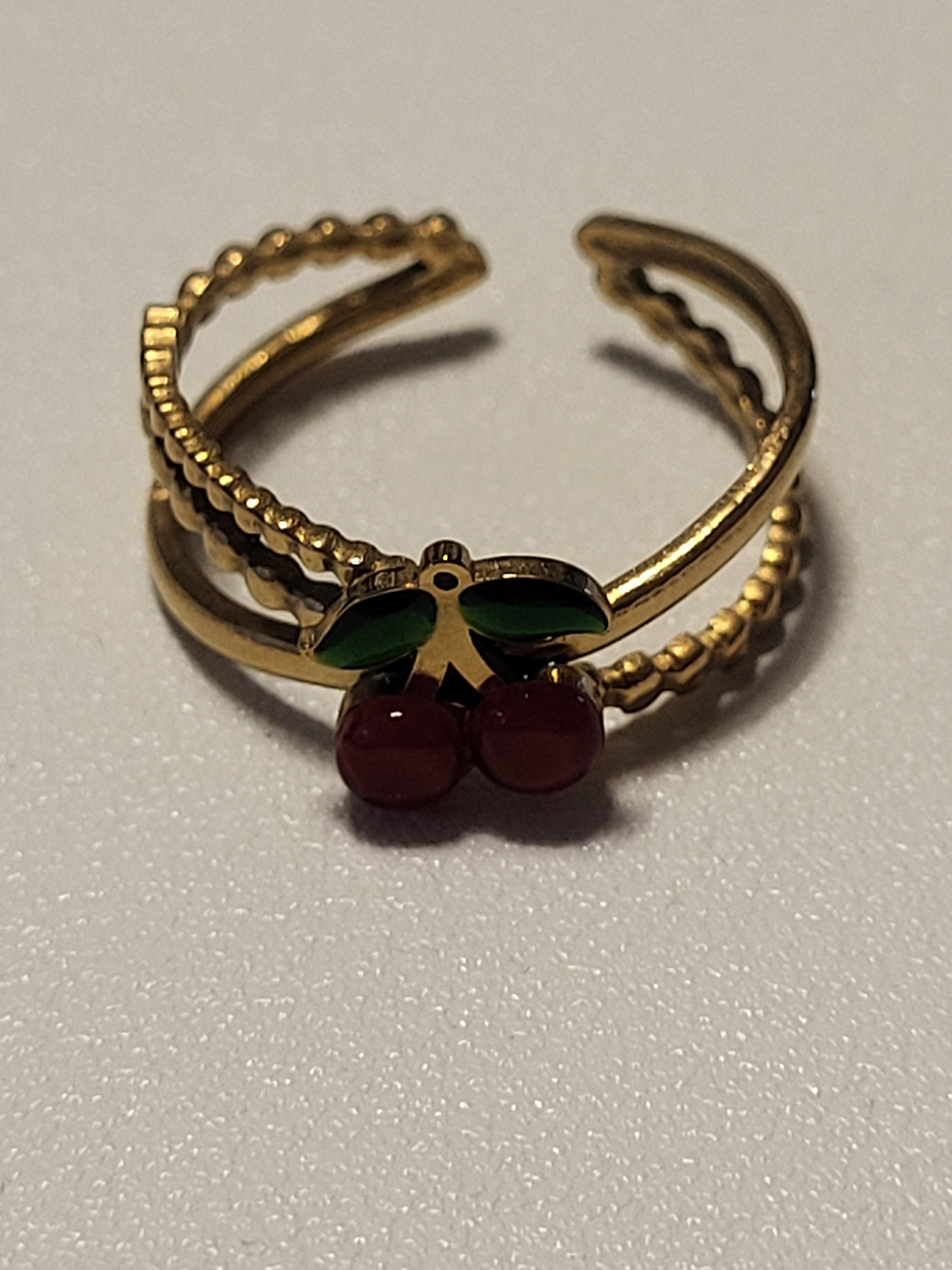 Bague ouverte en forme de cerise dorée acier inoxydable