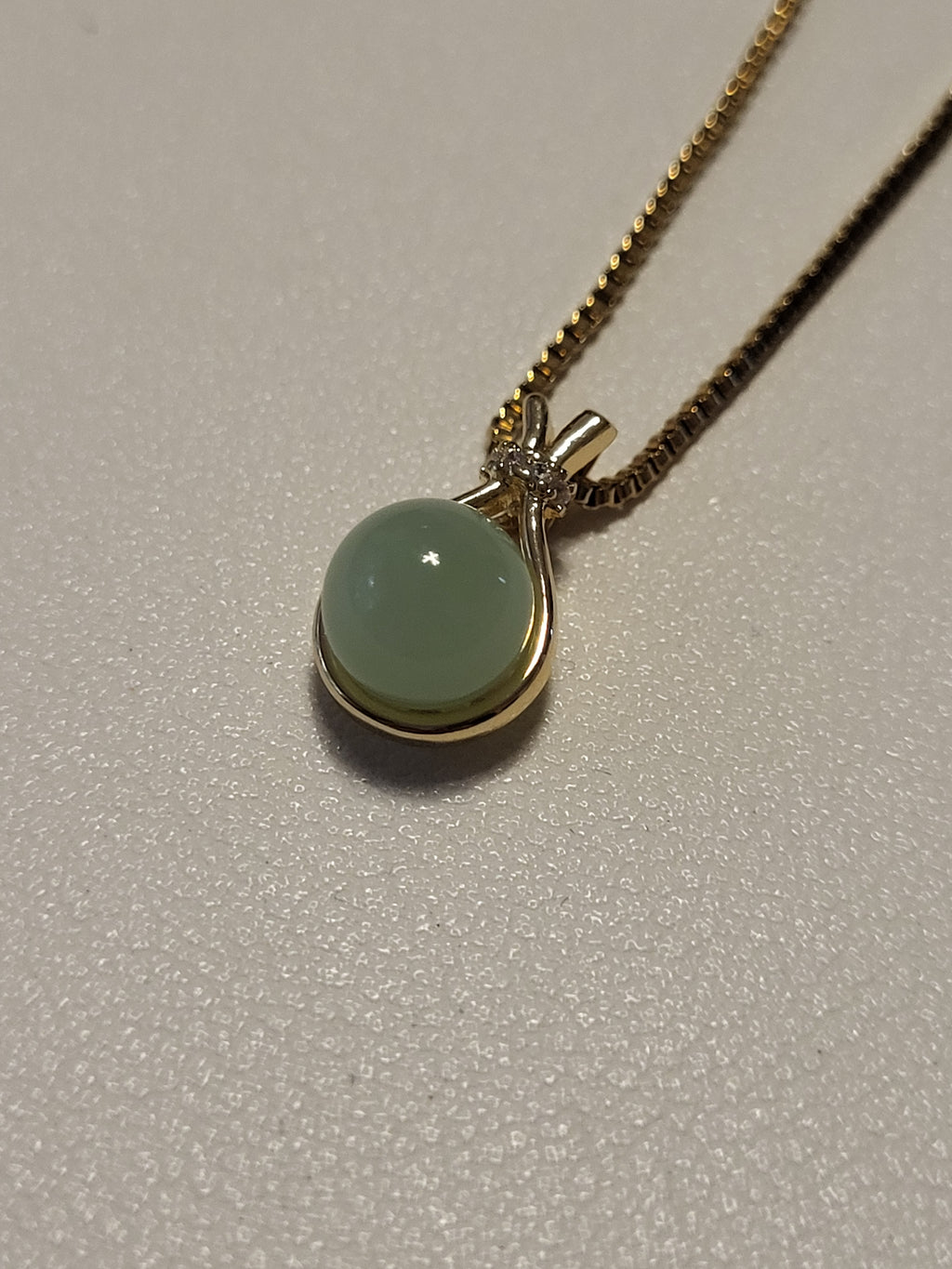 Collier pendentif acier inoxydable doré avec bille
