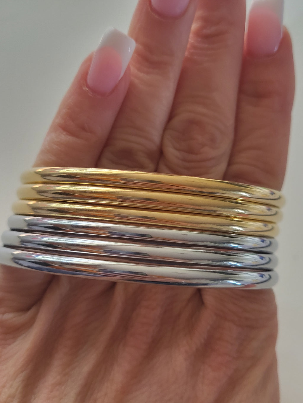6 Bracelets joncs en acier inoxydable doré et argenté