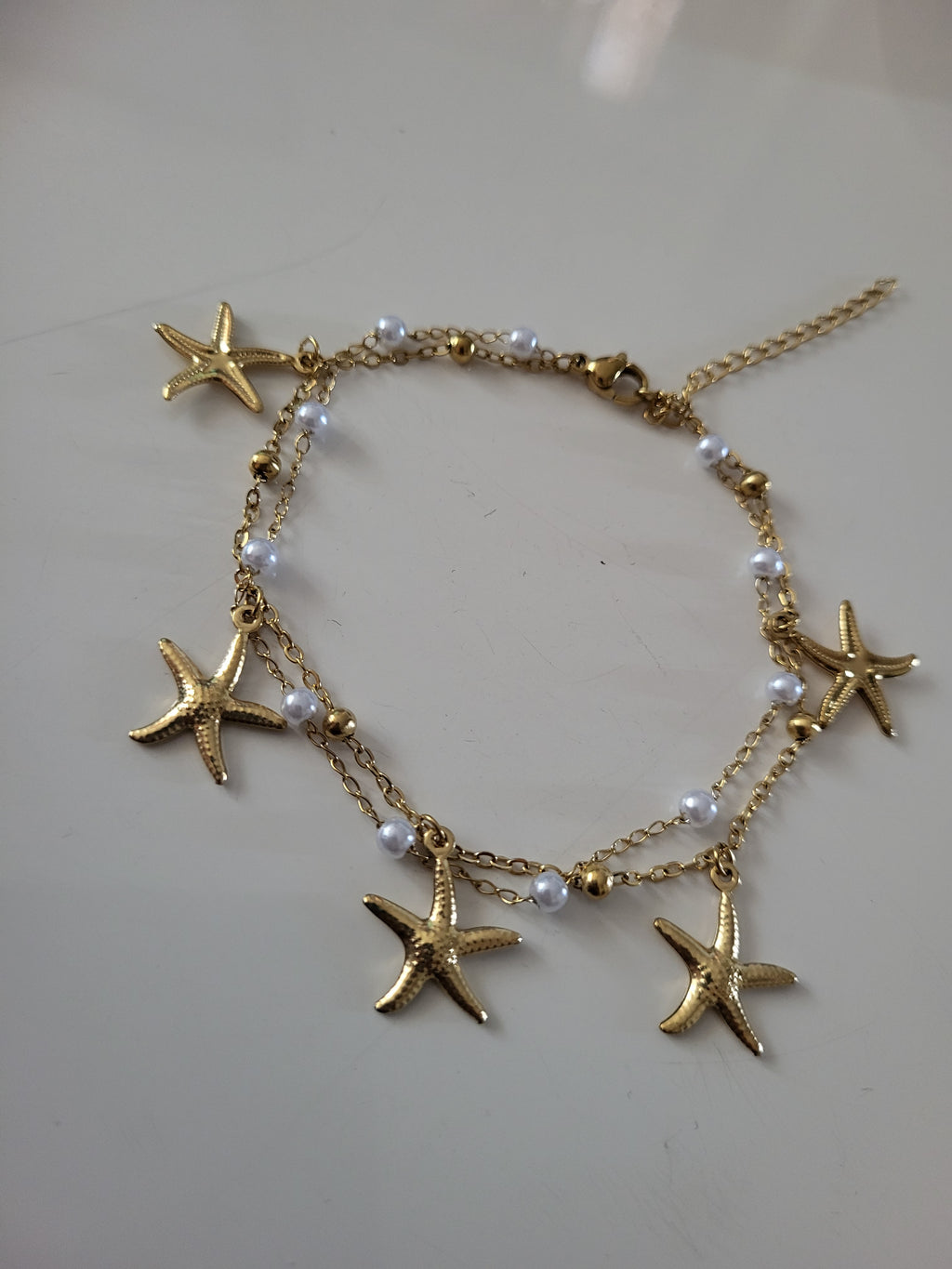 Bracelet de cheville thème océan avec étoile de mer en acier inoxydable doré