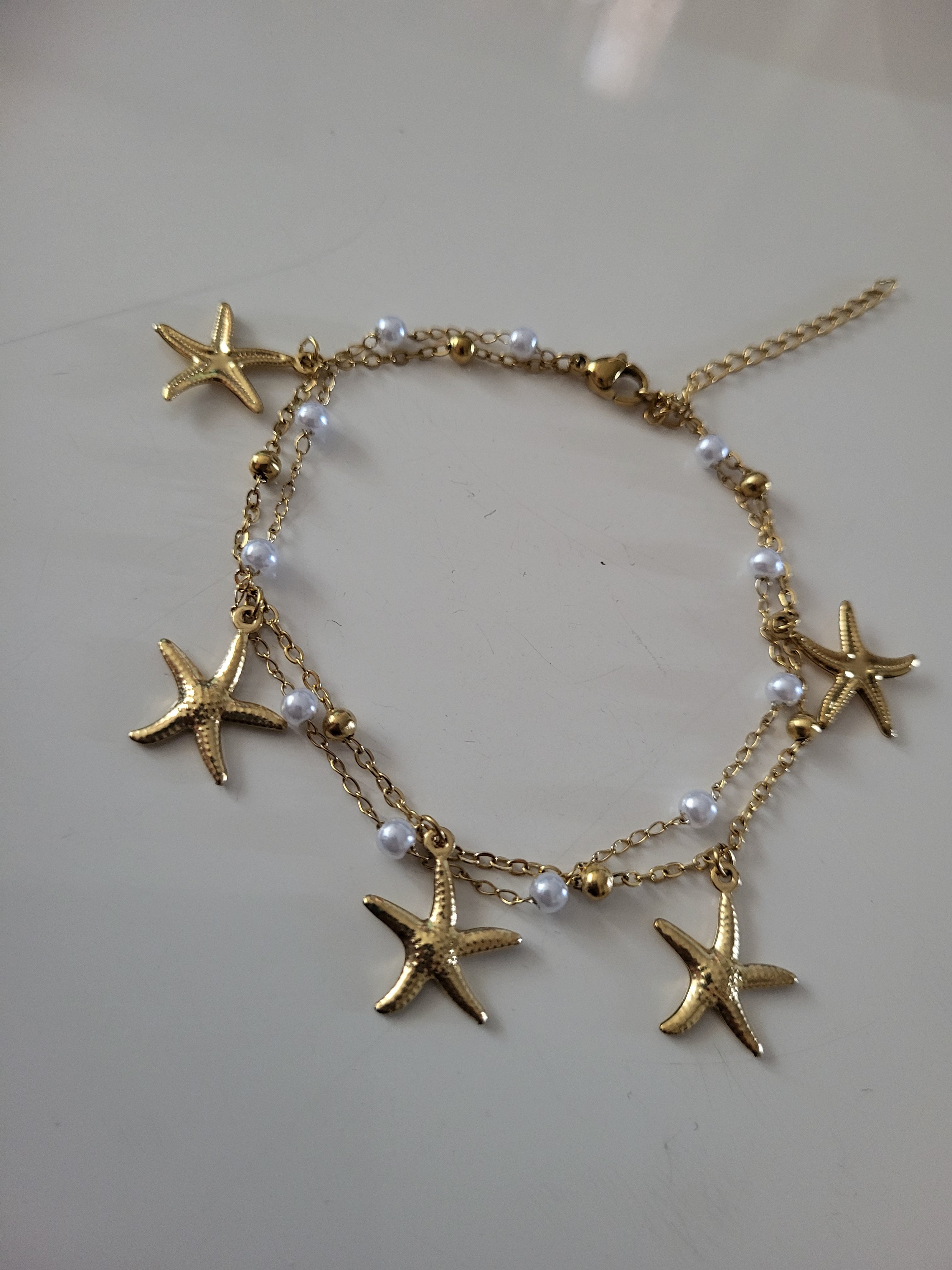 Bracelet de cheville thème océan avec étoile de mer en acier inoxydable doré