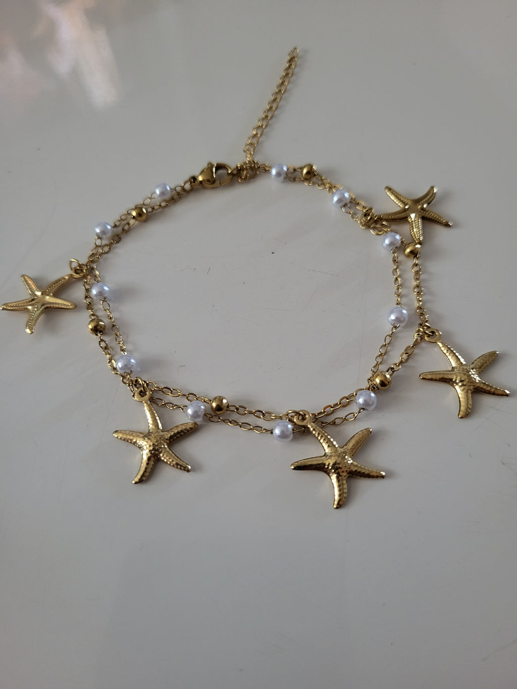 Bracelet de cheville thème océan avec étoile de mer en acier inoxydable doré