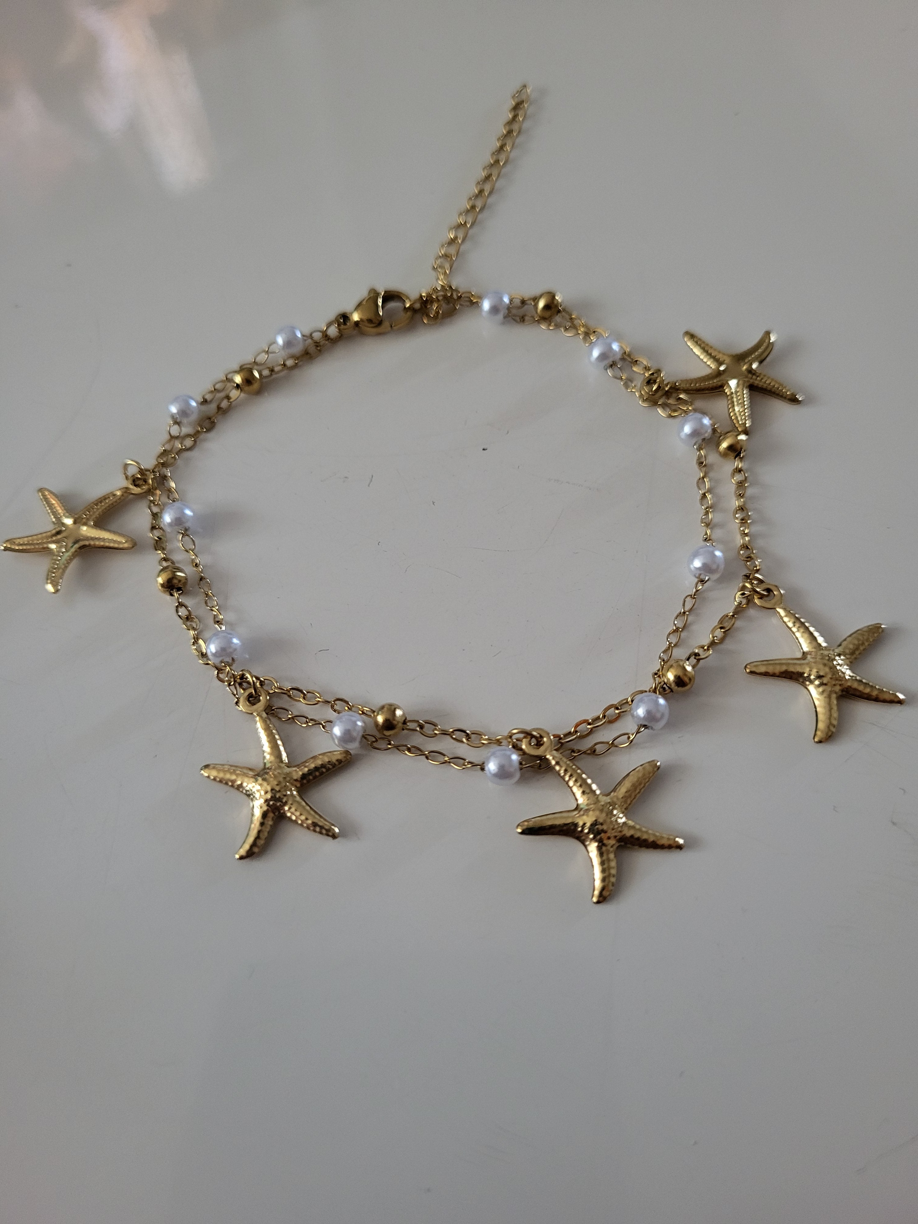 Bracelet de cheville thème océan avec étoile de mer en acier inoxydable doré