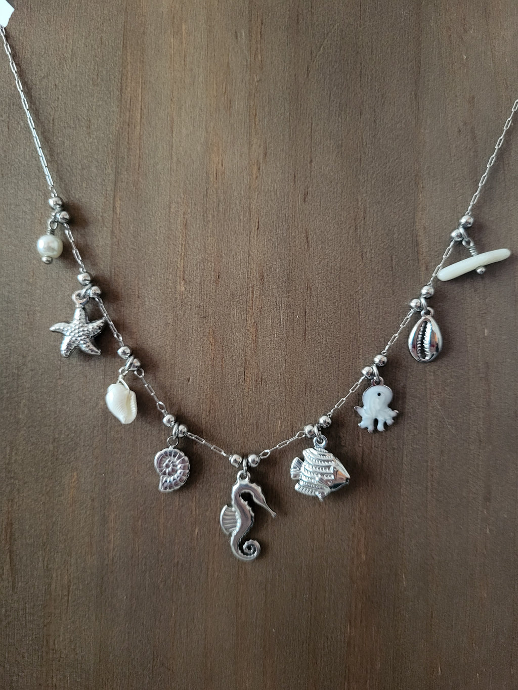 Collier pendentifs marins avec poulpe nacré argenté