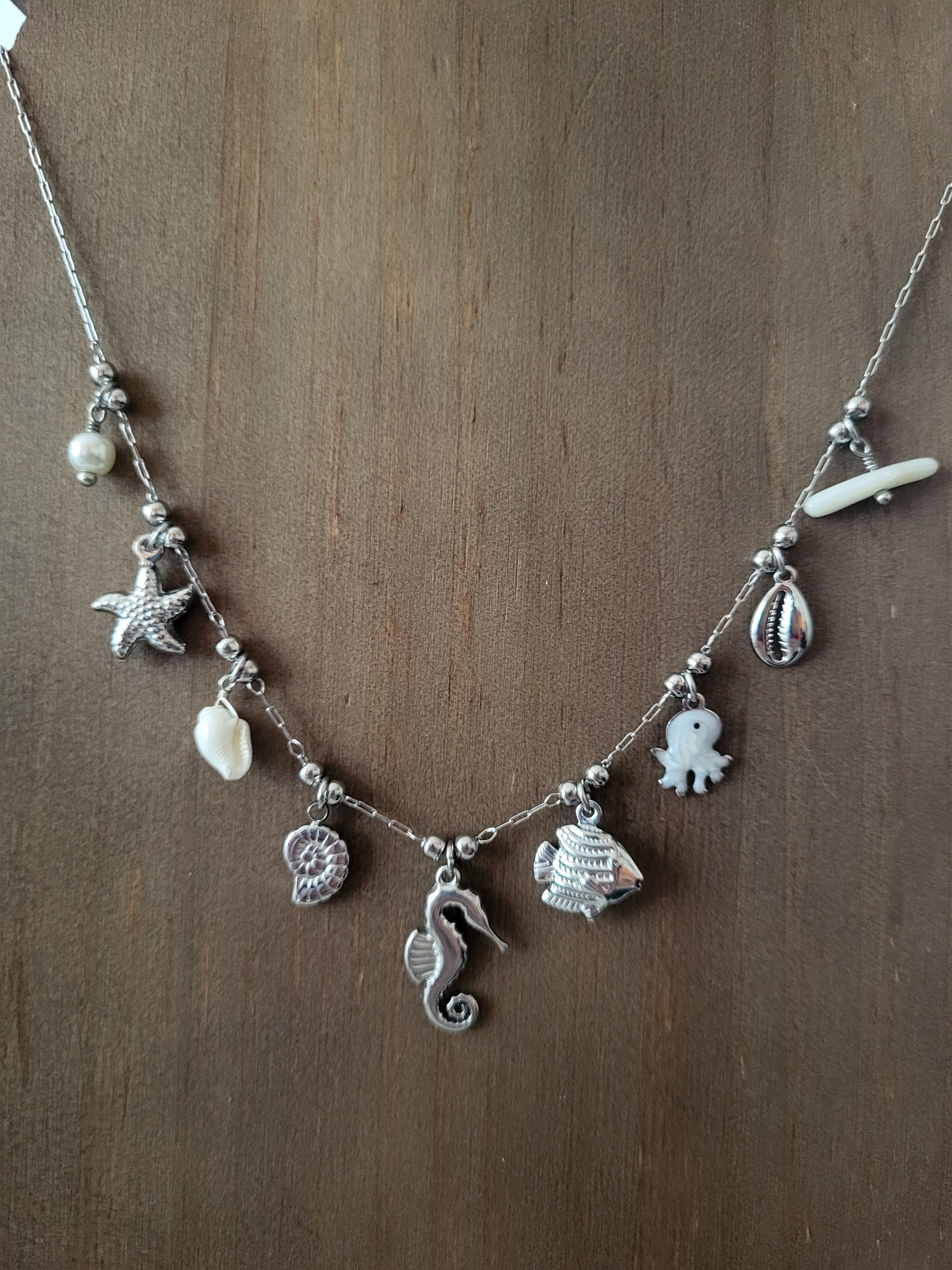 Collier pendentifs marins avec poulpe nacré argenté