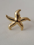 Bague dorée ajustable étoile de mer taille moyenne
