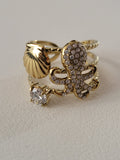 Bague ajustable poulpe strassé et coquillage doré