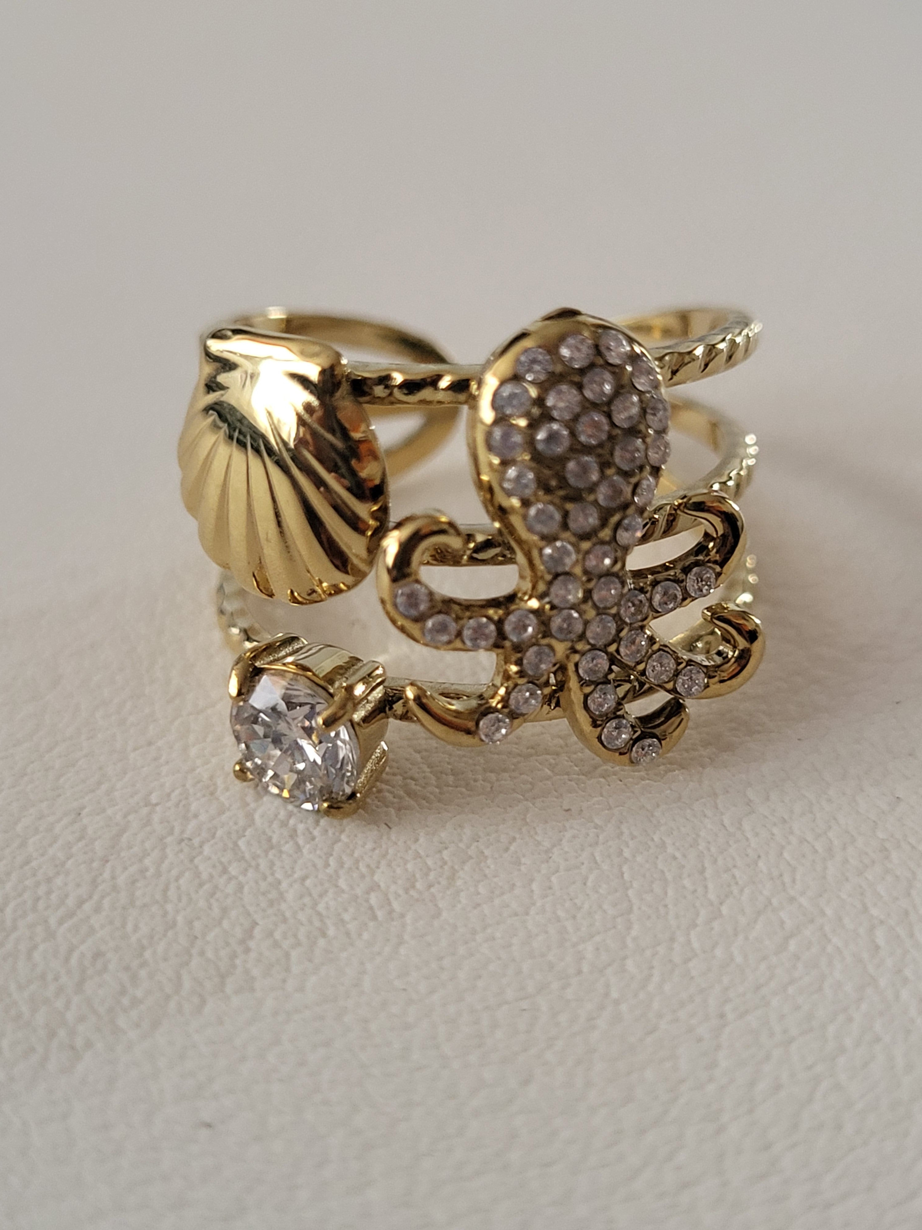 Bague ajustable poulpe strassé et coquillage doré
