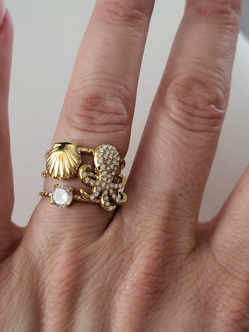 Bague ajustable poulpe strassé et coquillage doré