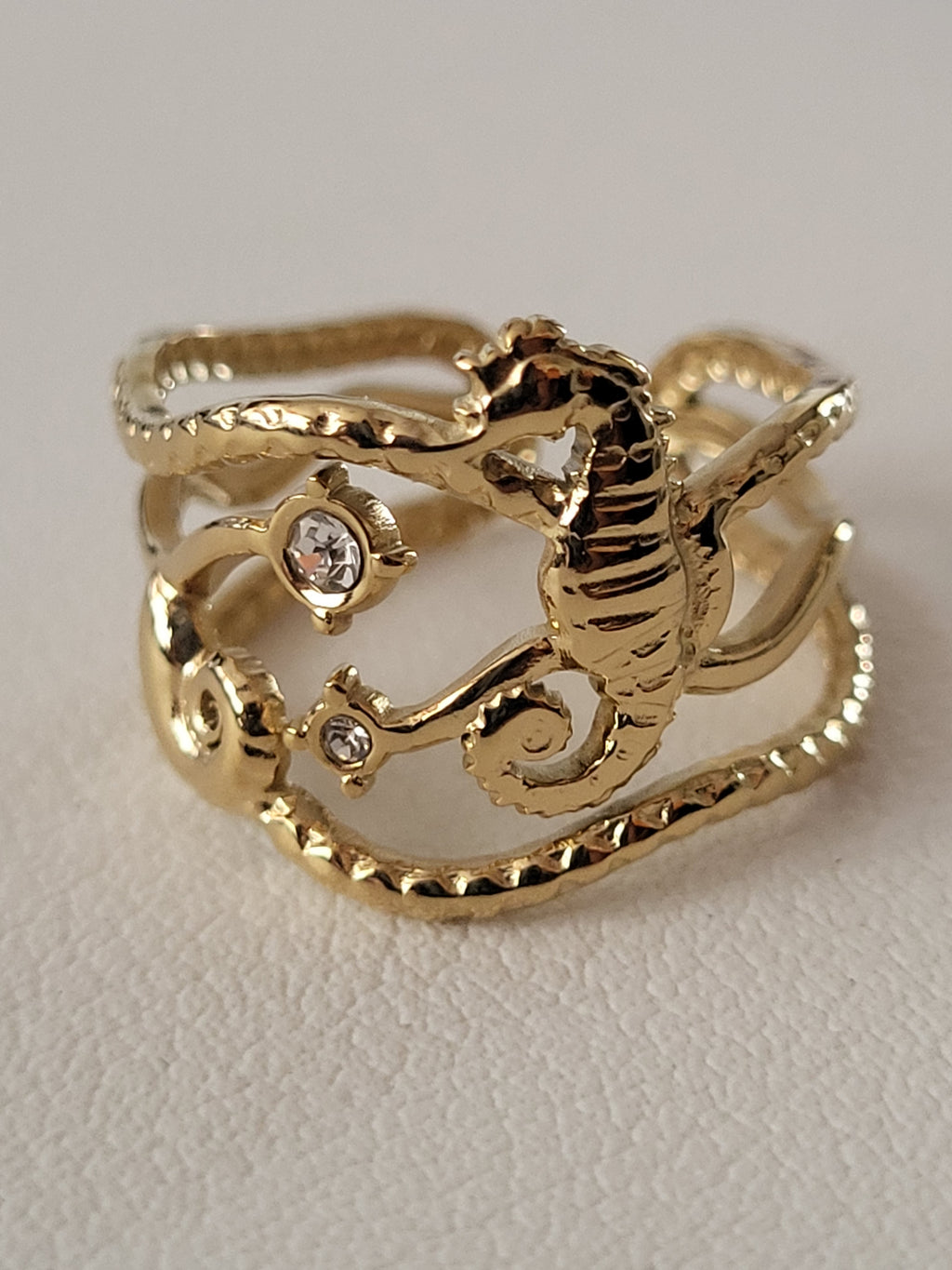 Bague ajustable hippocampe et étoiles marines doré