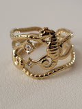 Bague ajustable hippocampe et étoiles marines doré