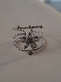 Bague ajustable à trois anneaux avec fleur strassée argenté