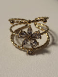 Bague ajustable à trois anneaux avec fleur strassée doré