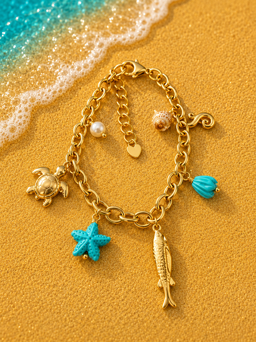 Bracciale dorato con ciondoli animali marini e stella marina blu