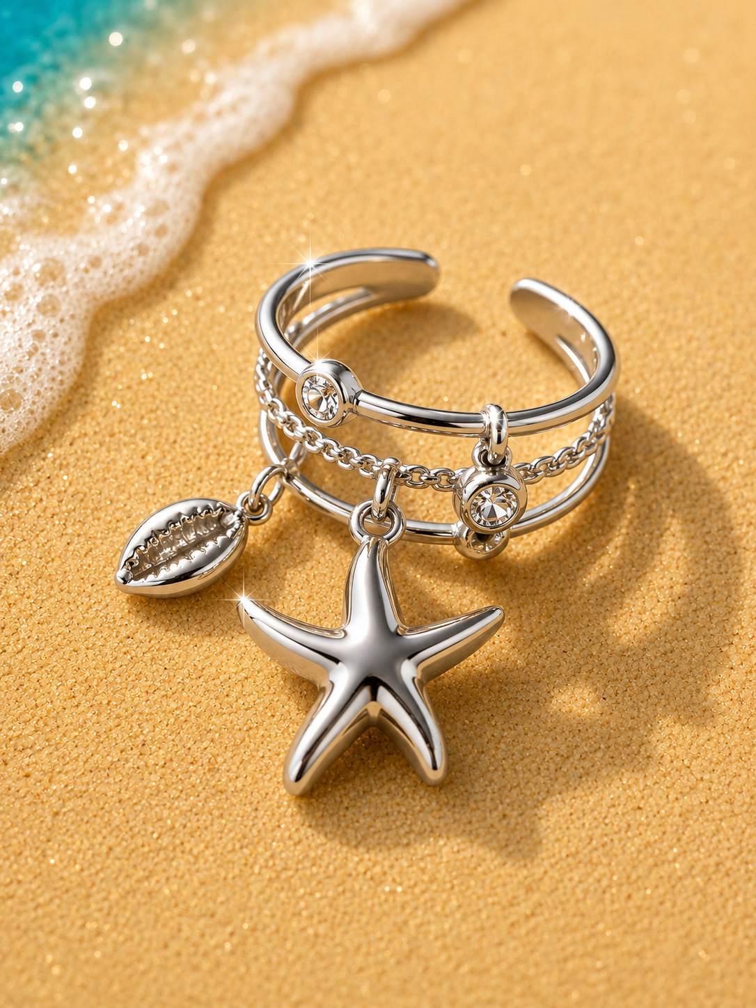 Anello aperto a triplo cerchio con stella marina e strass argentati