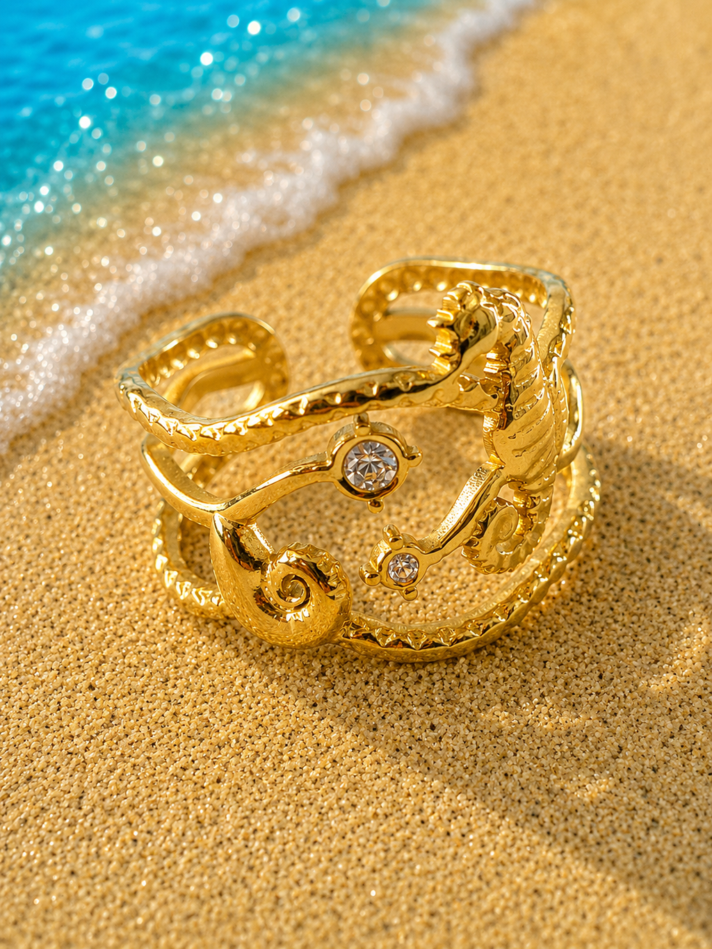 Bague ajustable hippocampe et étoiles marines doré