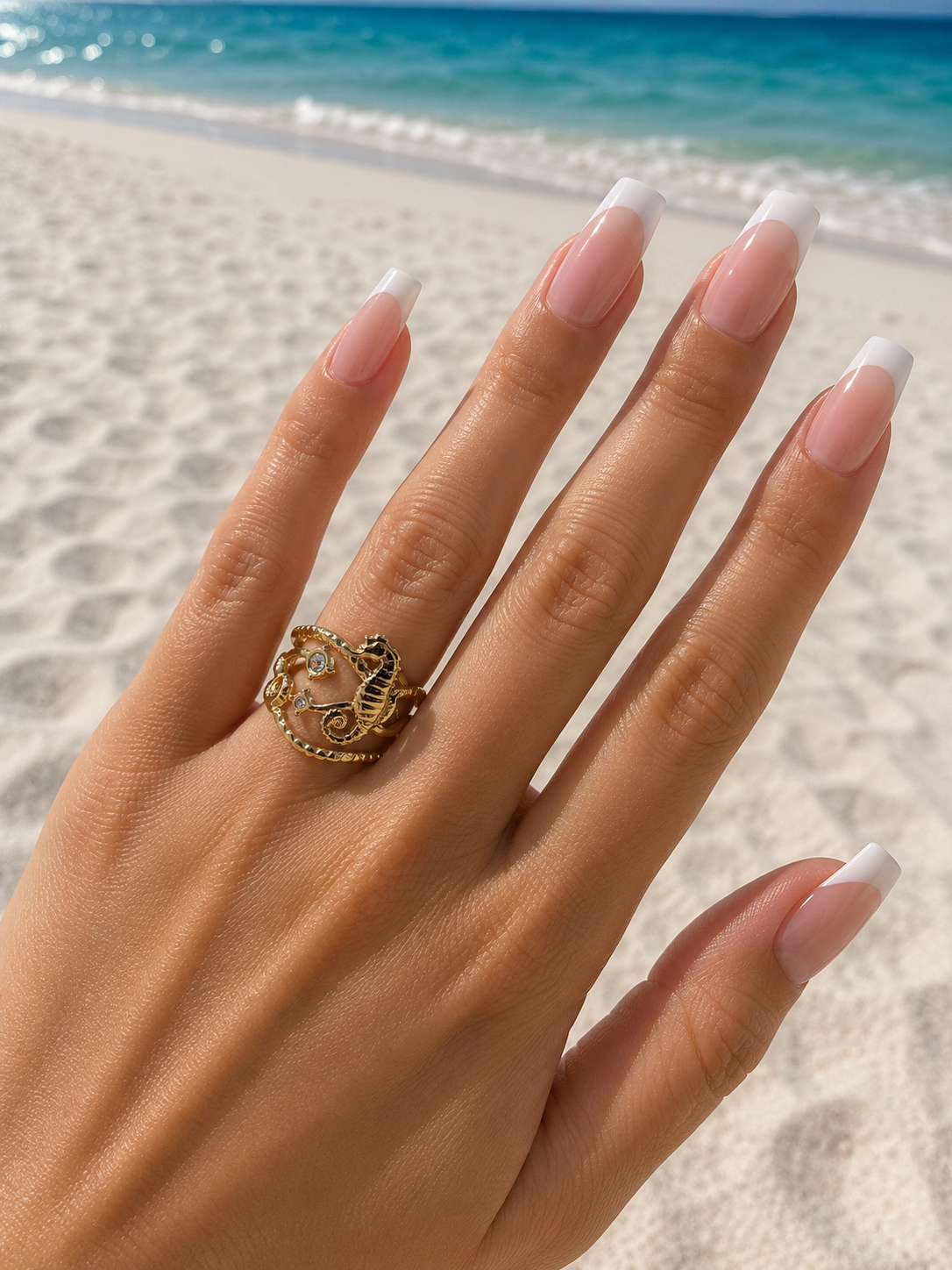 Bague ajustable hippocampe et étoiles marines doré