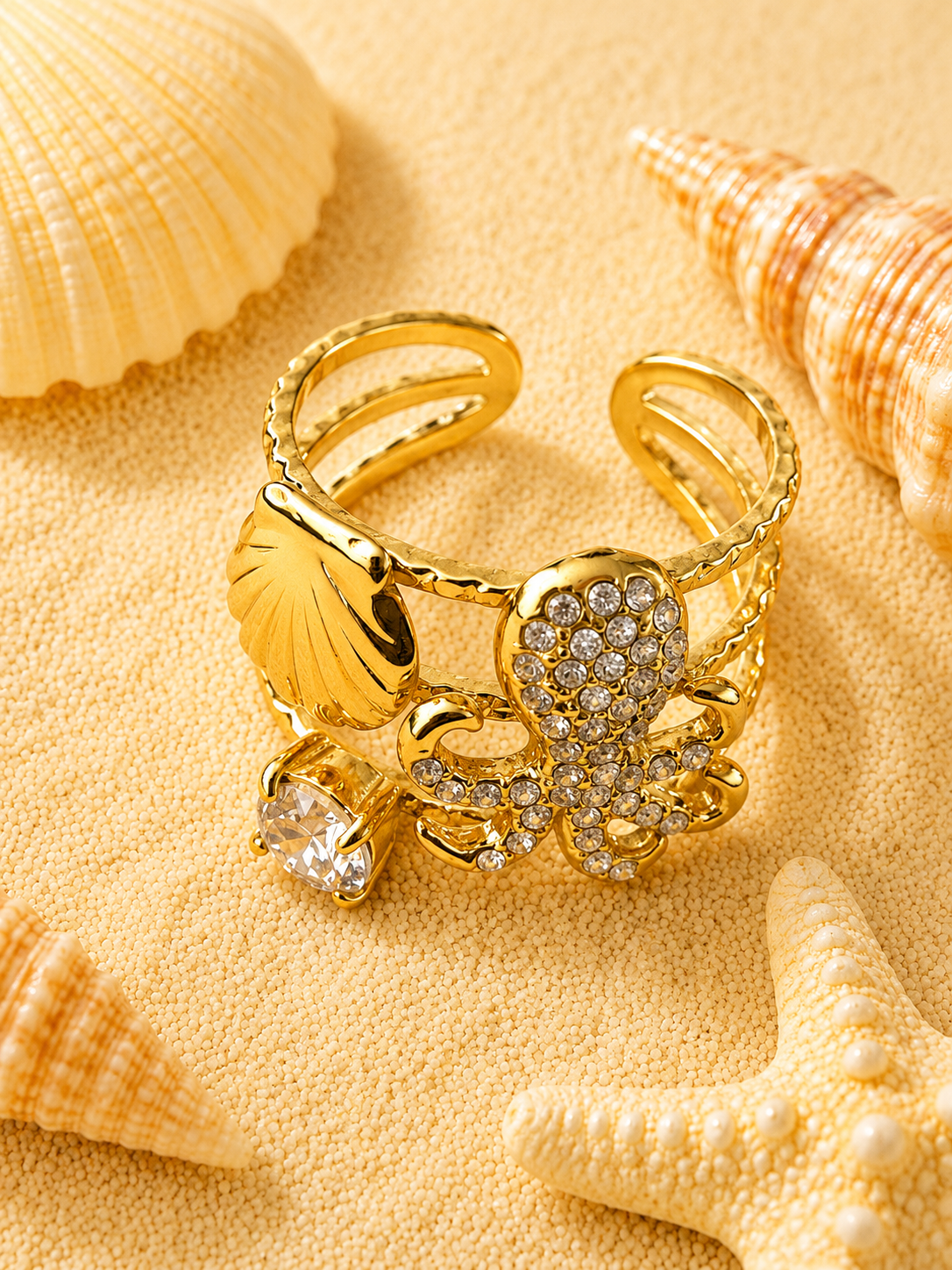 Bague ajustable poulpe strassé et coquillage doré