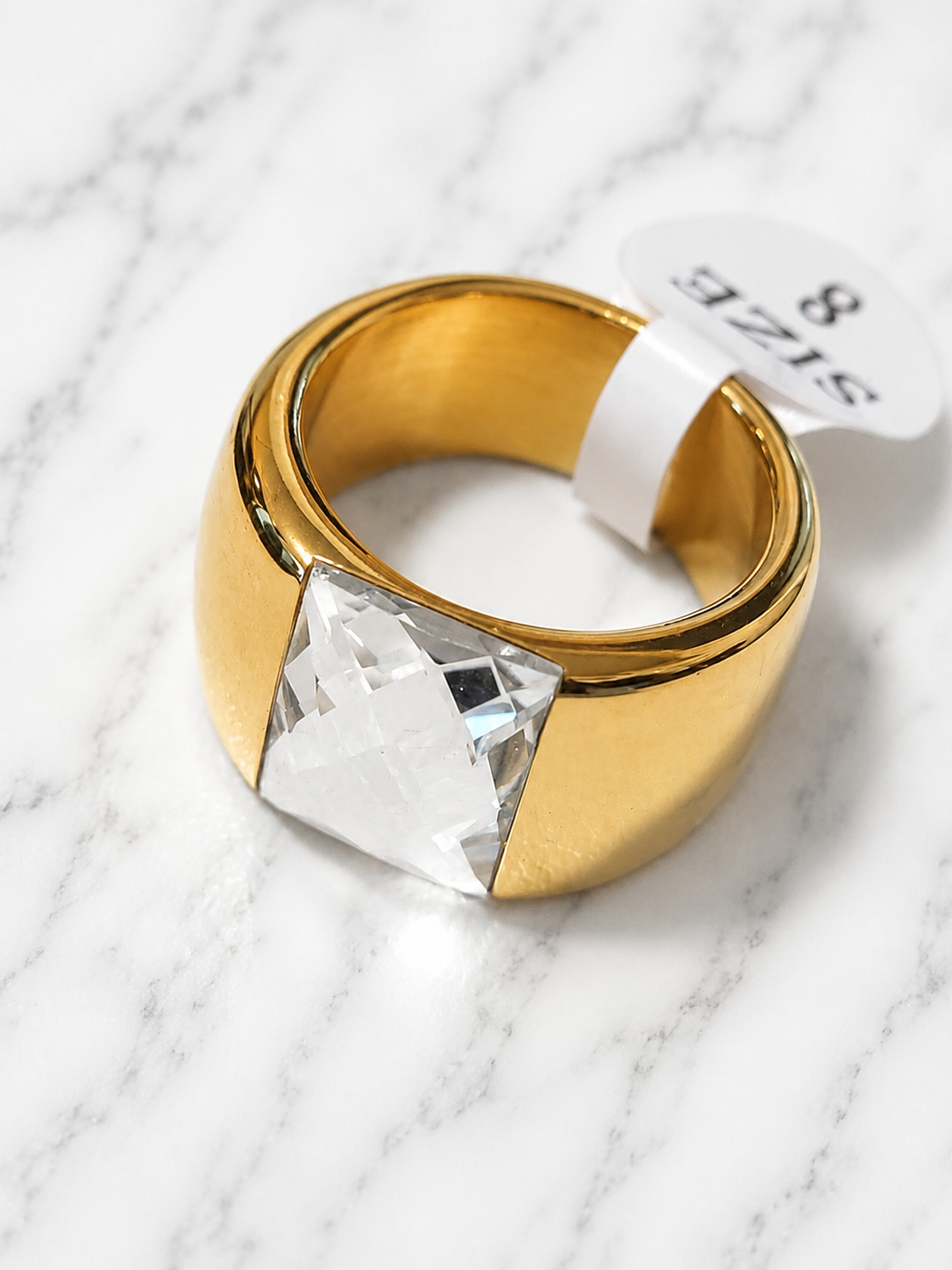 Anello in acciaio inossidabile dorato con pietra bianca taglia 8