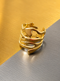 Anello in acciaio inossidabile dorato con arabesco