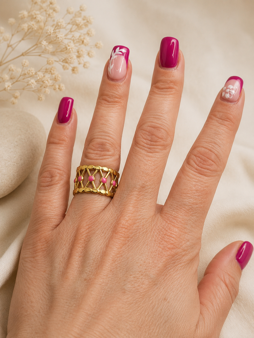 Bague acier inoxydable doré croisillons points roses