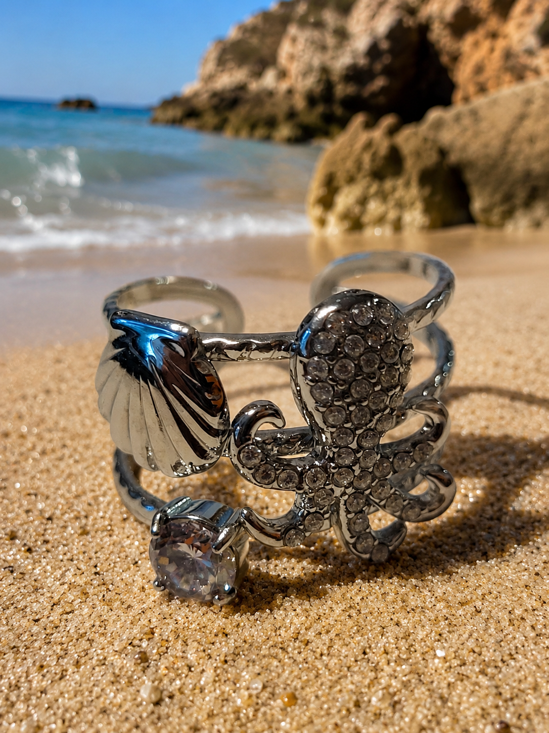 Bague ajustable poulpe strassé et coquillage argenté
