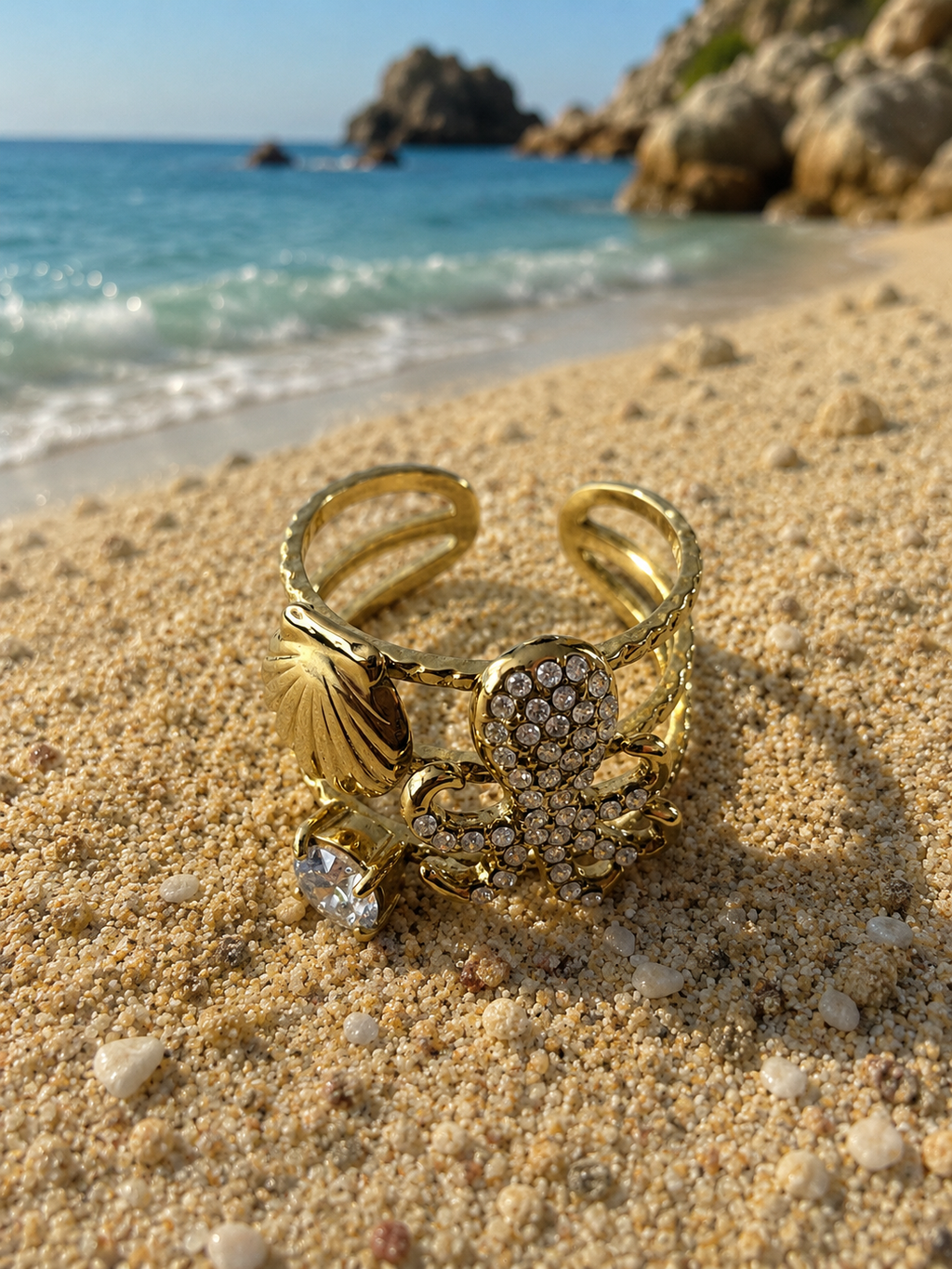 Bague ajustable poulpe strassé et coquillage doré