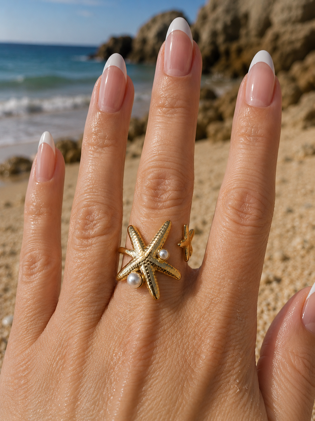 Bague dorée ouverte à l'avant à 2 étoiles de mer avec perles