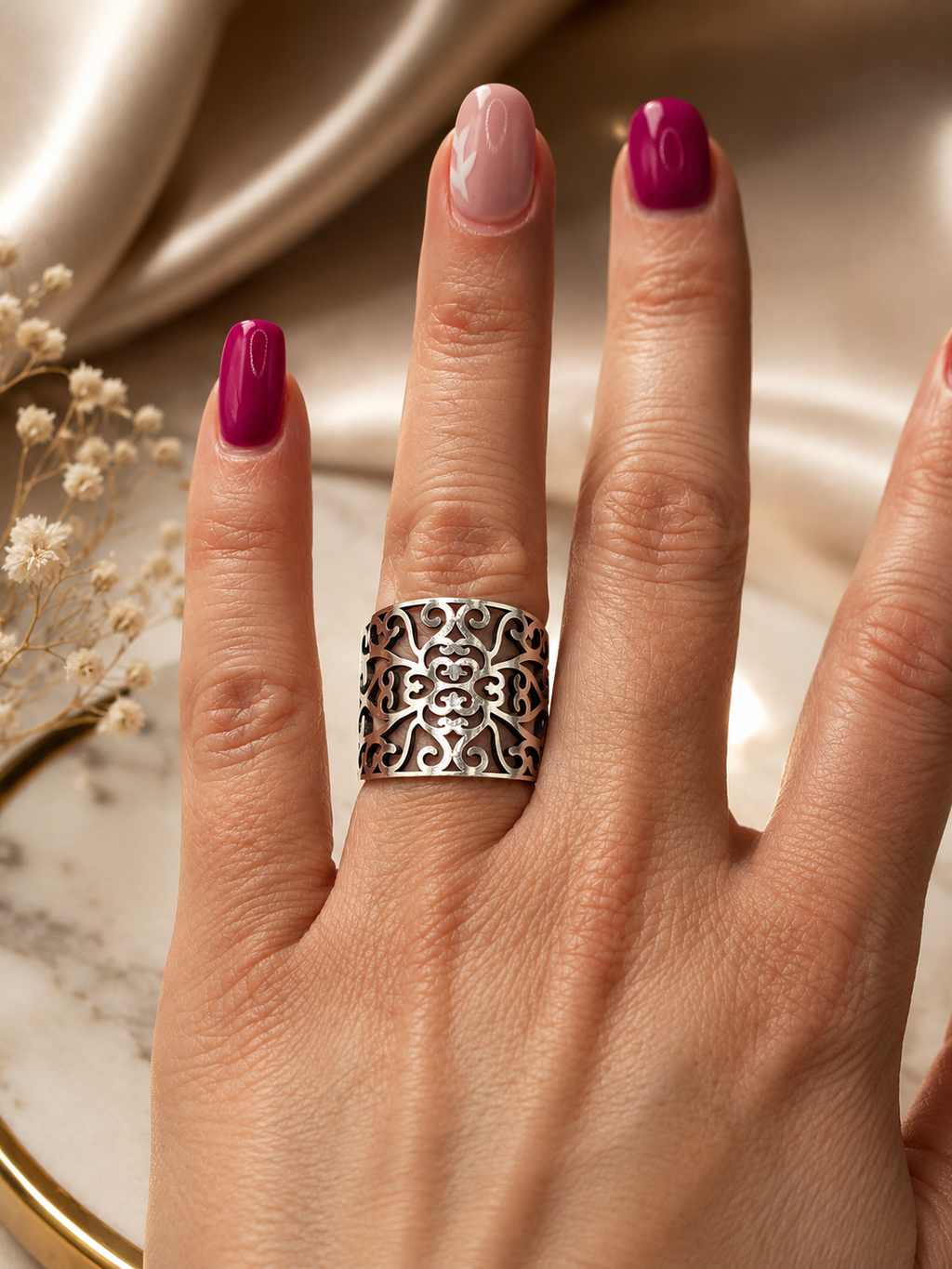 Bague acier inoxydable ajustable motif floral ajouré argenté